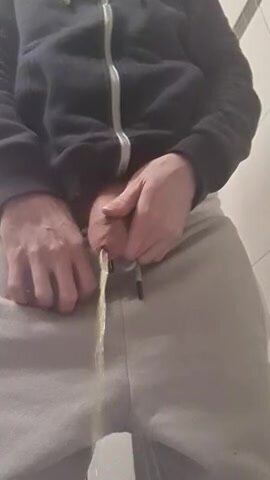 Thick uncut cock piss in the toilet