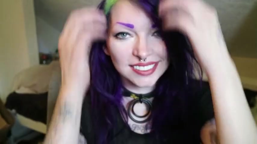 cute punk hippie chick shows off mouth and drool