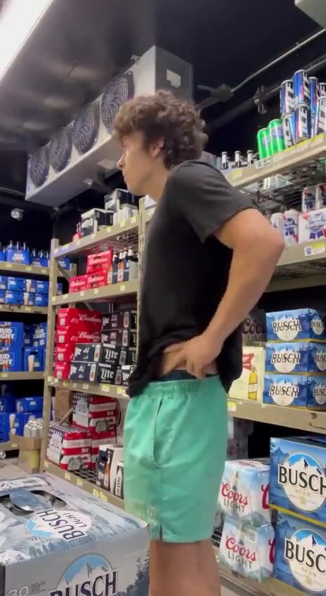 pulling out his dick in a store - video 2