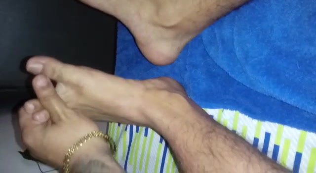 Straight guy showing his feet for money