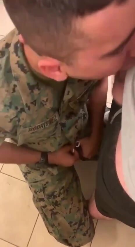 Soldier giving a blowjob