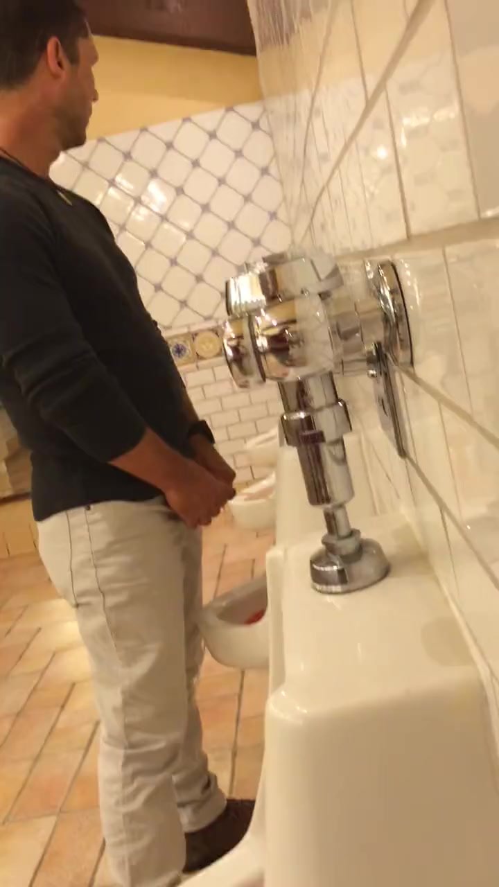 MEN PISSING AT THE URINAL 11