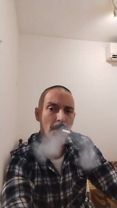Enjoying a smoke - video 6