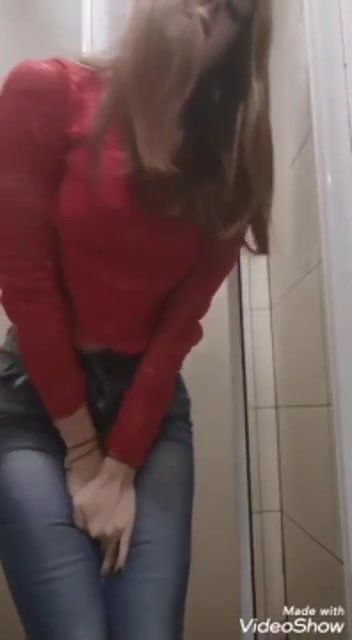 Cute girl pee in jeans