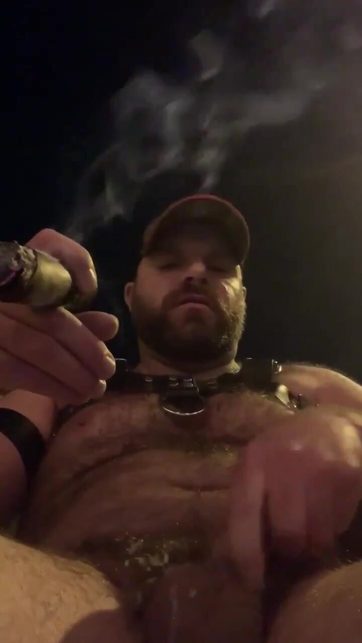 Daddy bear smokes a cigar and has a nice wank