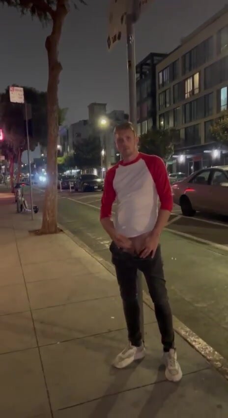 Showing off big dick in the middle of the city