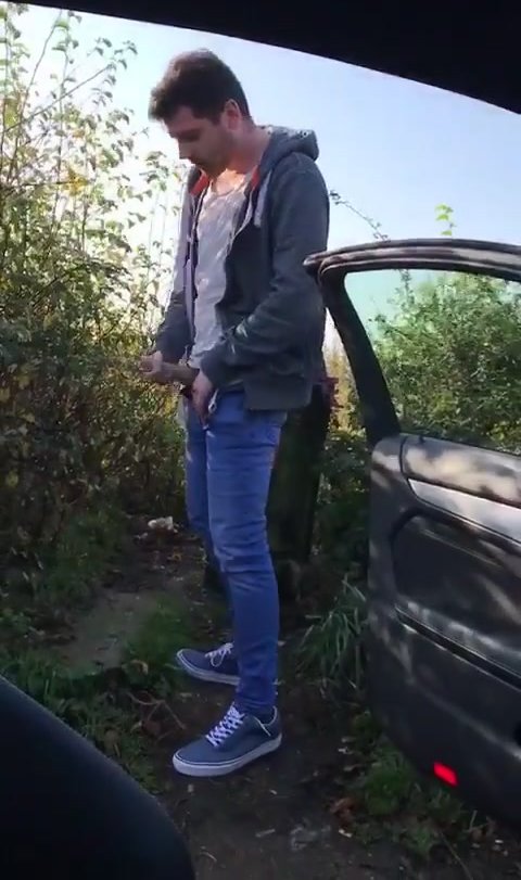 jerking off next to his car