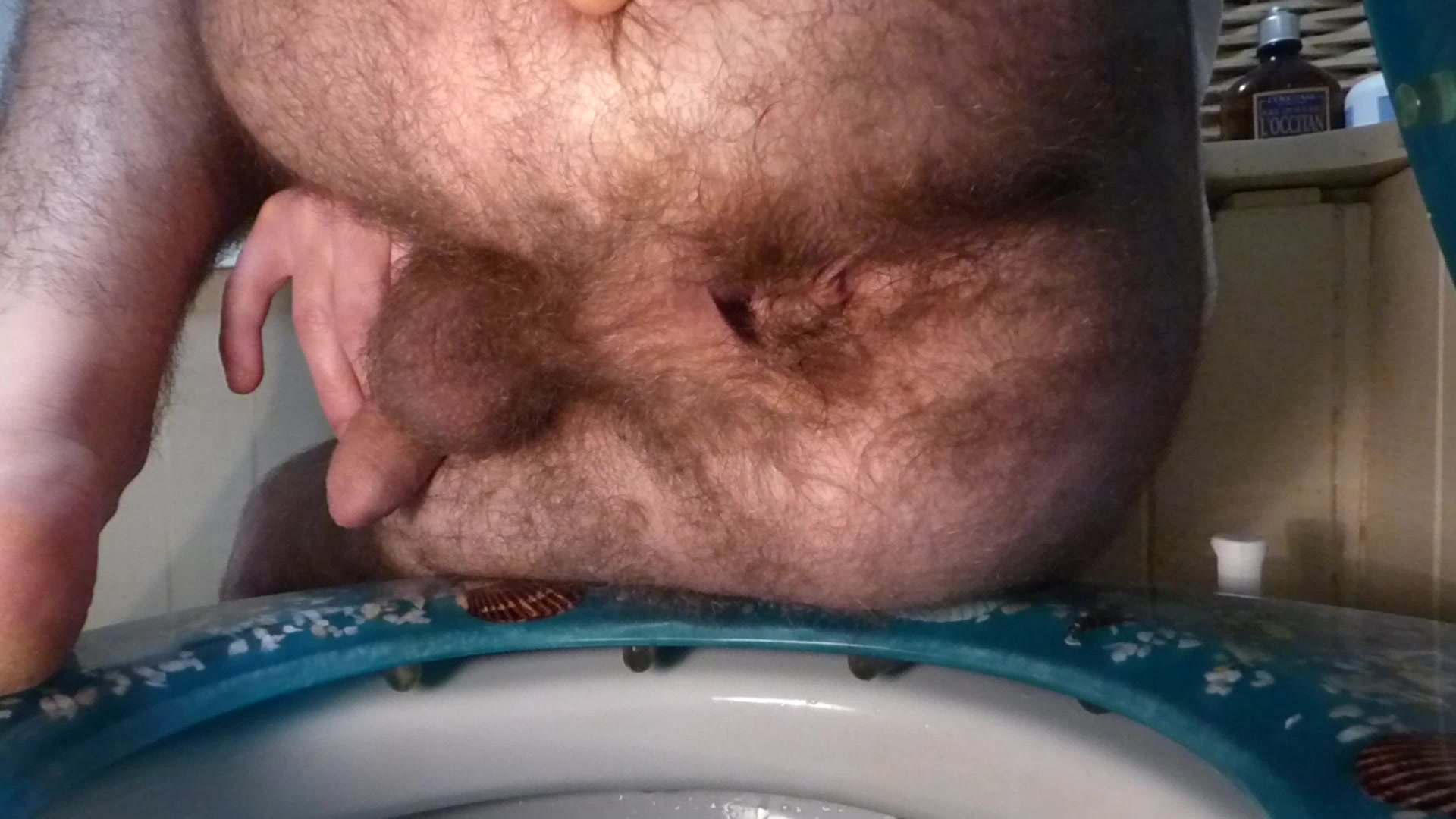 Shitting on the toilet - video 5