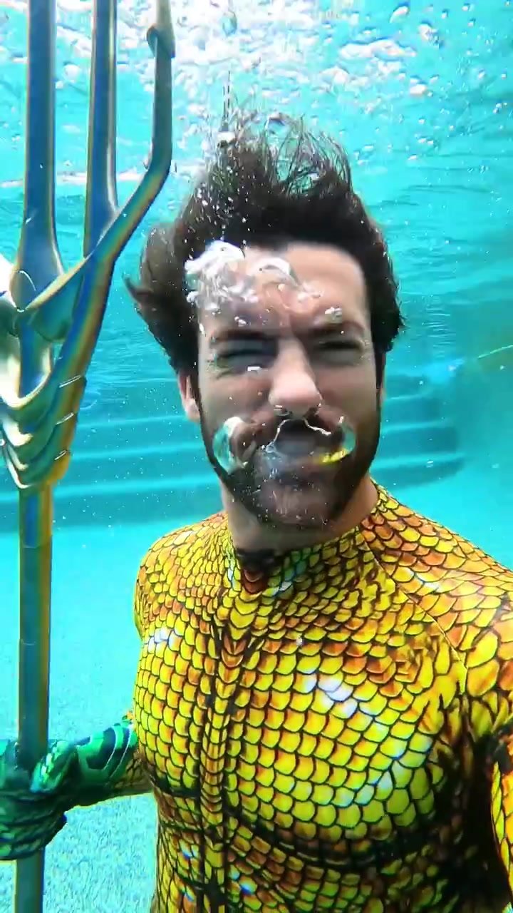 Underwater barefaced bearded aquaman