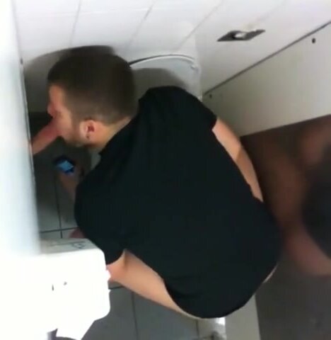 Horny guy gets sucked off in restroom glory hole