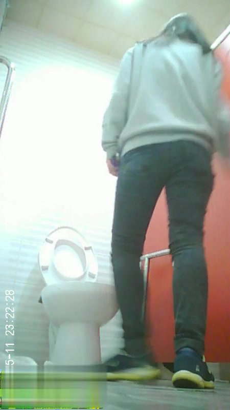 Girl piss on floor in toilet