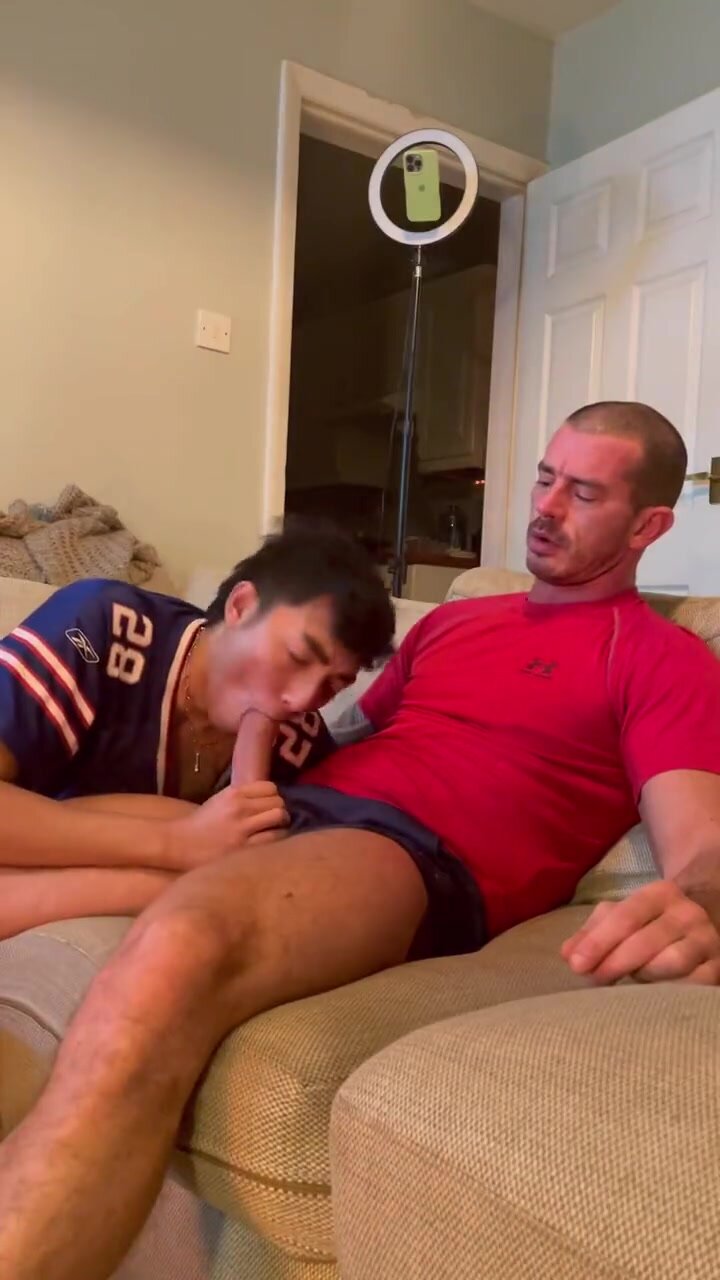 Sucking daddy while he watches rugby