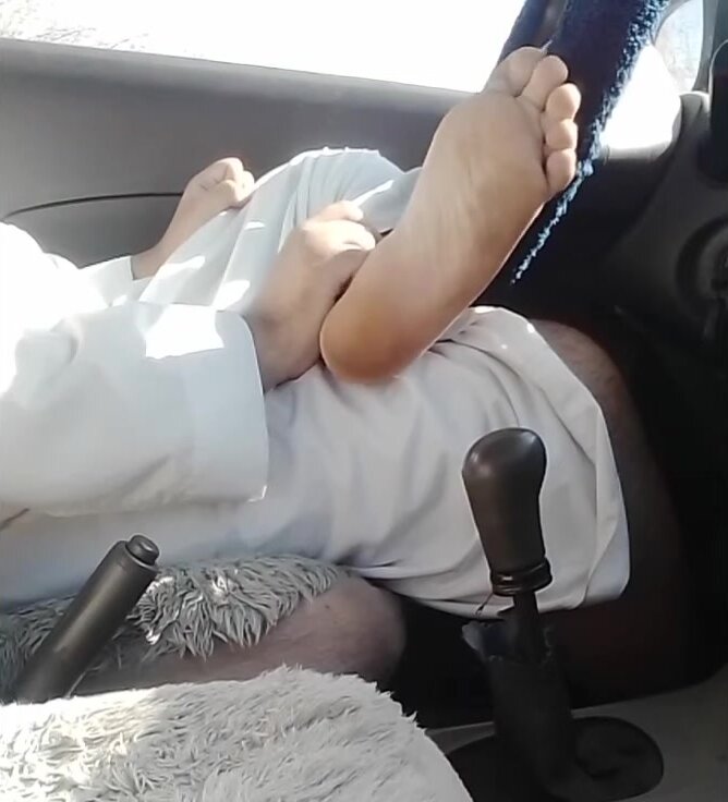 showing off my feet in the car