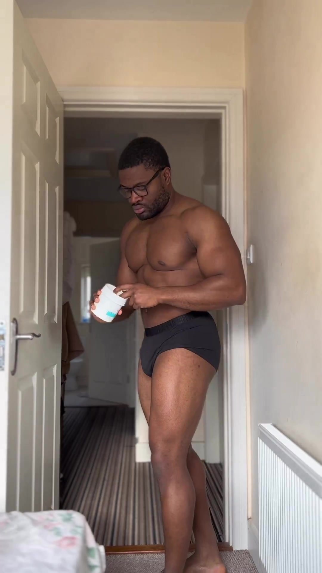 Sexy man gets ready for the day