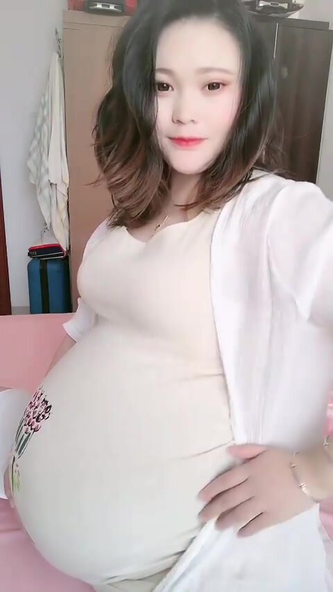 Chinese mom big pregnant belly
