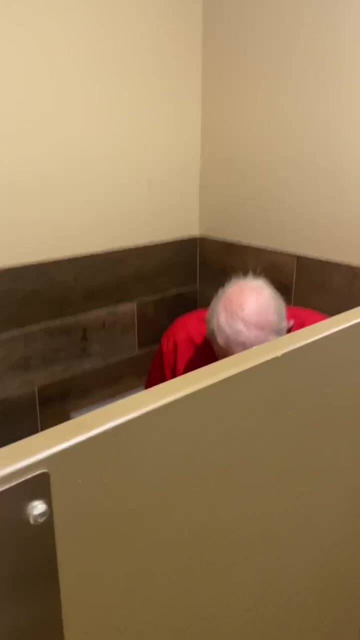 older man using the bathing