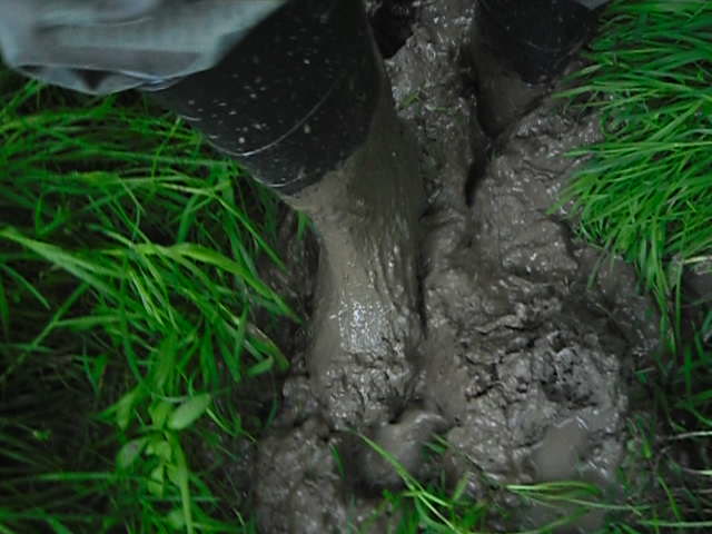 Rubber boot in mud