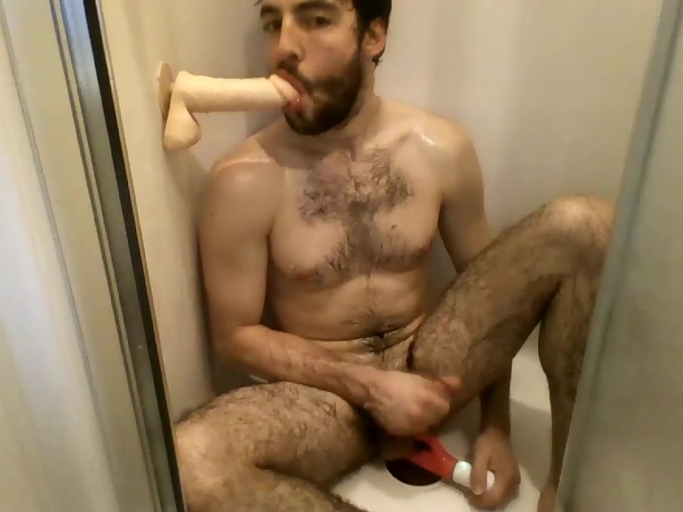 Furry cam guy with dildos in shower.