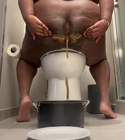 BBW dropping soft logs in cooking pot.