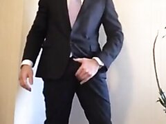 Hottie in suit gets naked and jerks off