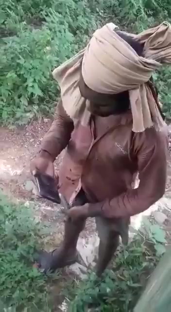 A guy masturbating outdoor