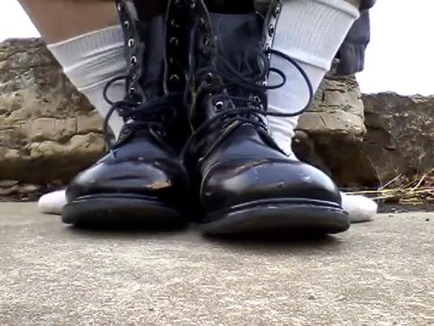 Combat boots and well worn socks