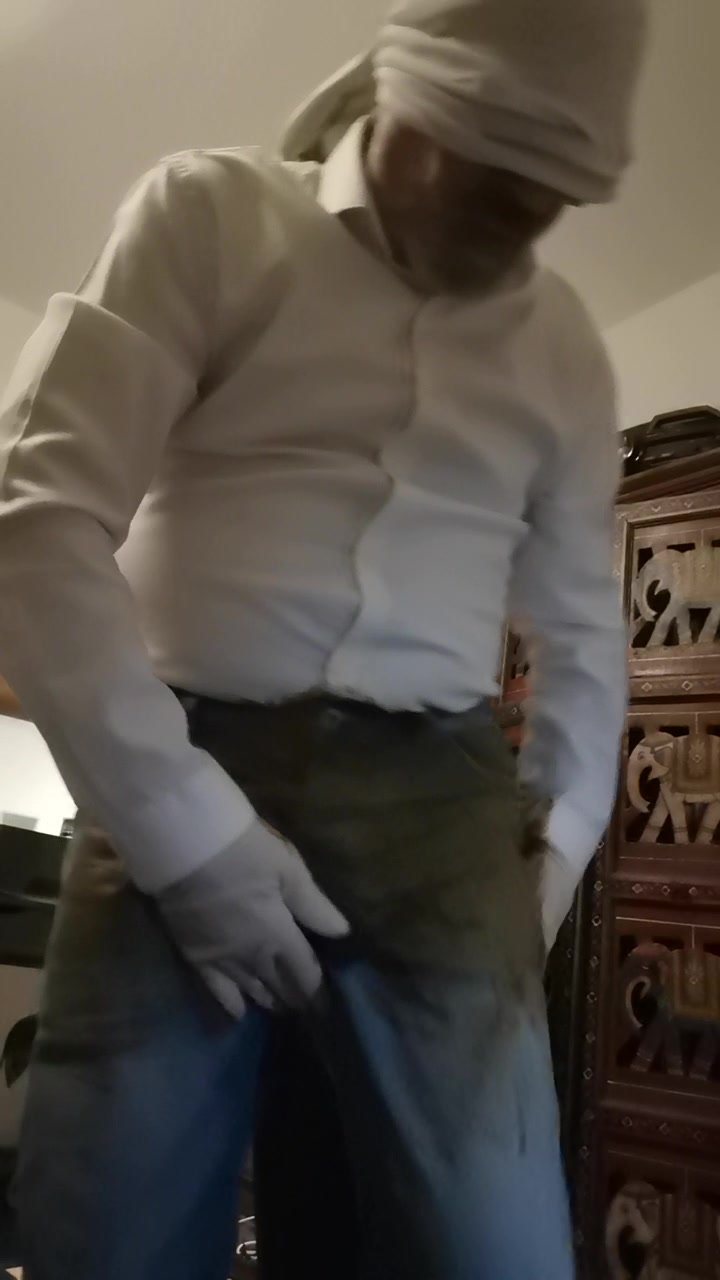 scat in white shirt and jeans