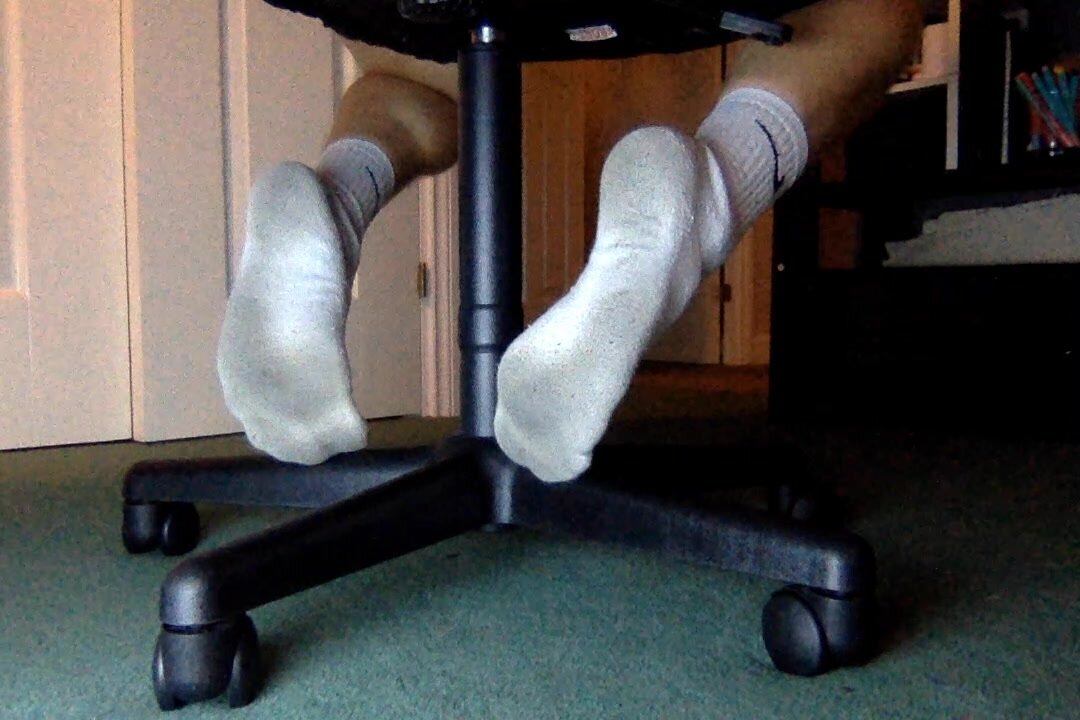 Under Chair POV - Dirty white socks
