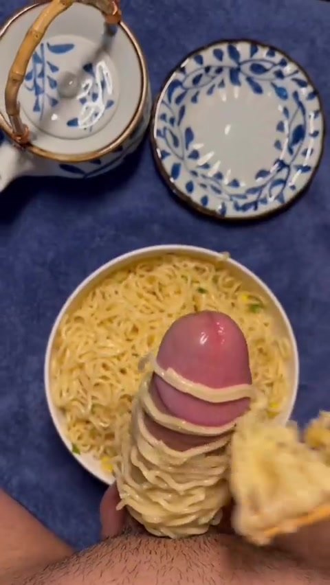 Big dick playing with noodles and cum on it