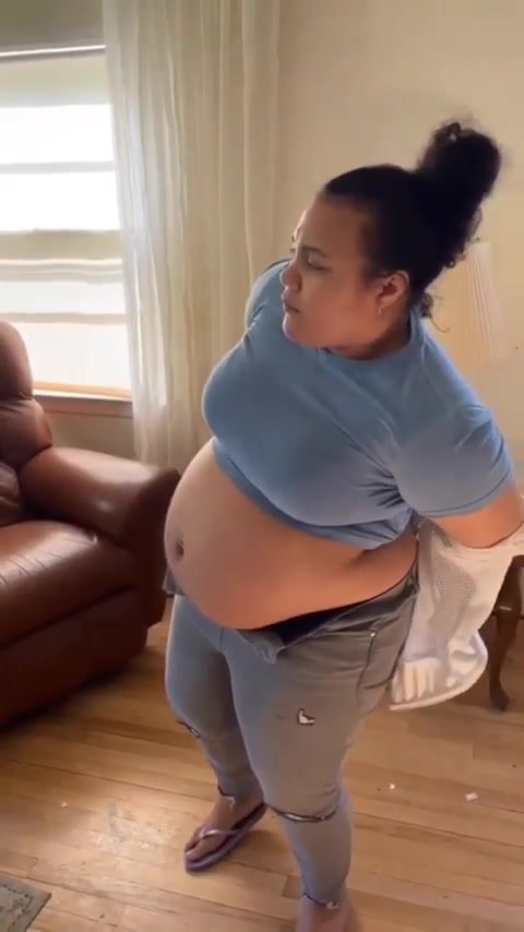 chubby girl show her thick and fat belly  0