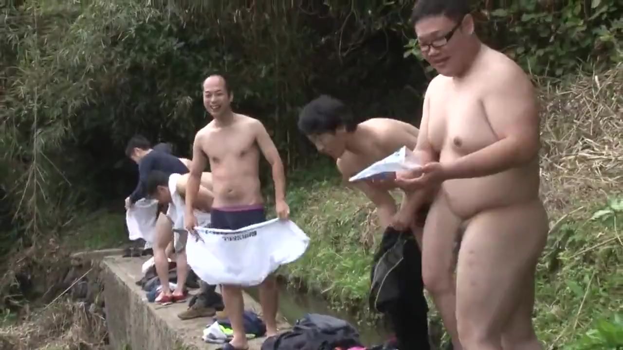 group of asian boys in the water