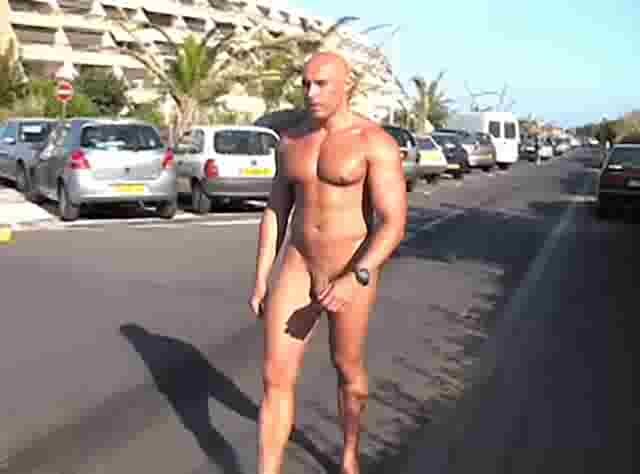 Naked bodybuilder in the street