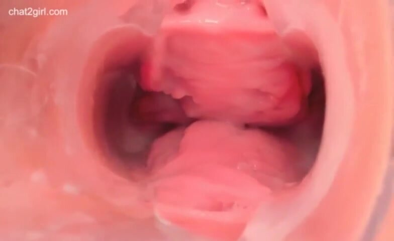 Gaping her creamy Asian pussy, shows cervix too