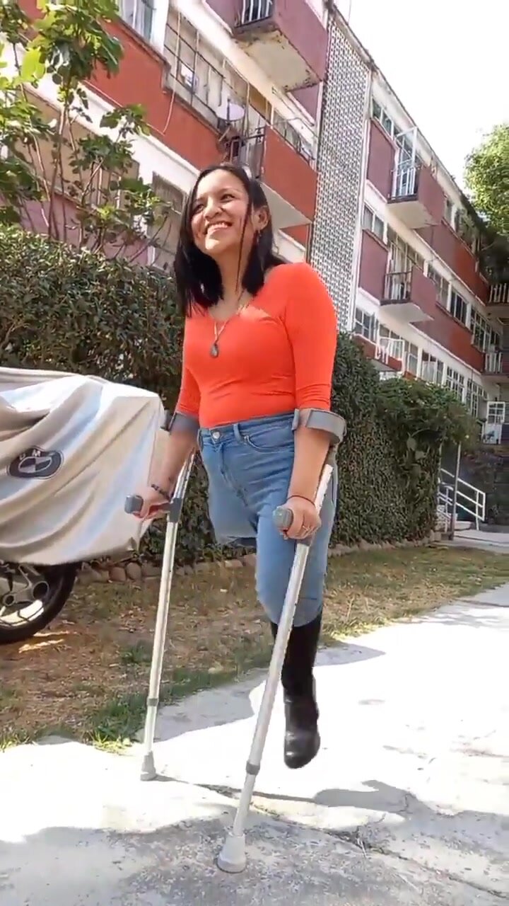 Amputee woman high heel crutches