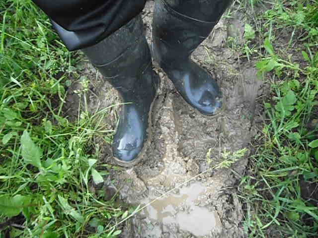 Rubber boots in mud