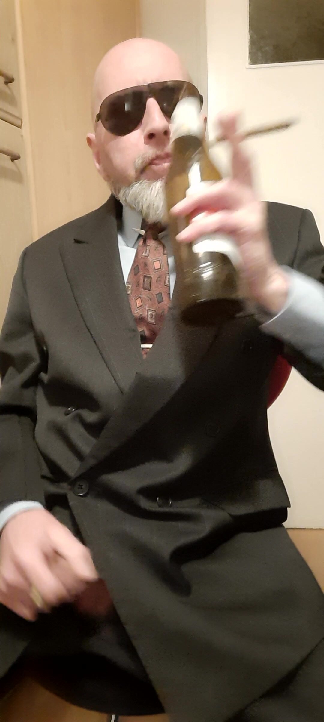 Wank drunken in suit and tie