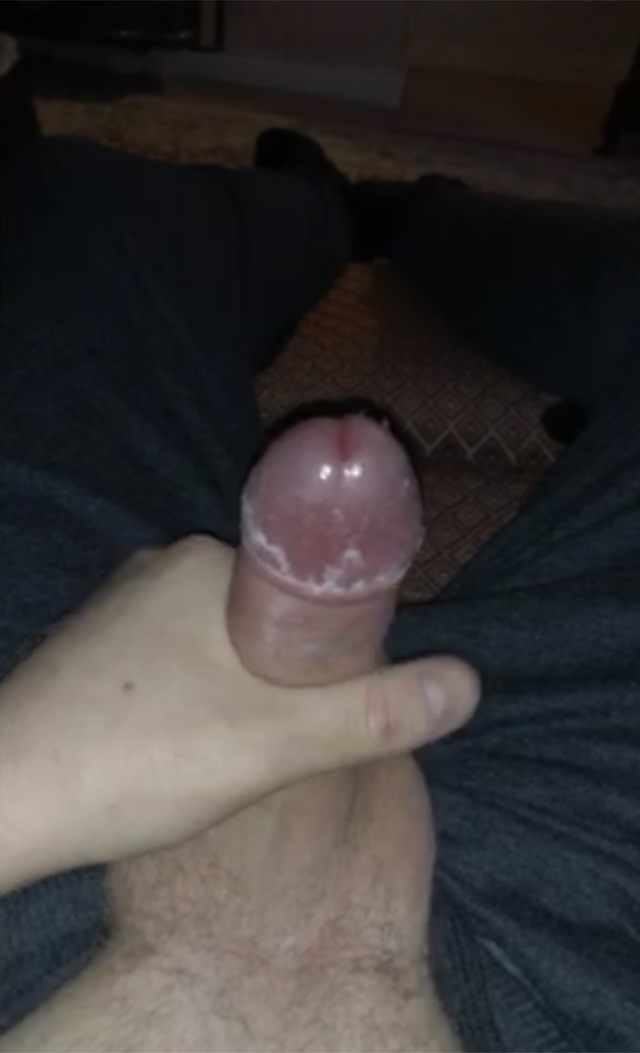 Twink plays with the thick smegma covering his cock