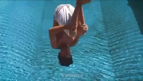 Cfnm man dives into pool and loses trunks