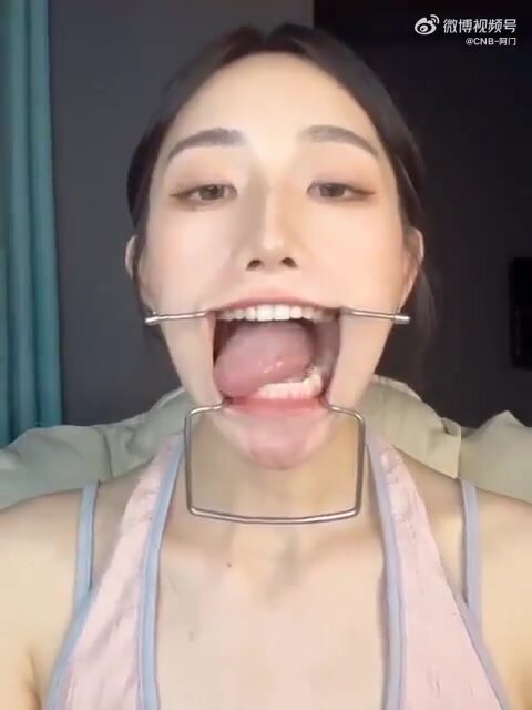 chinese girl shows her uvula 13