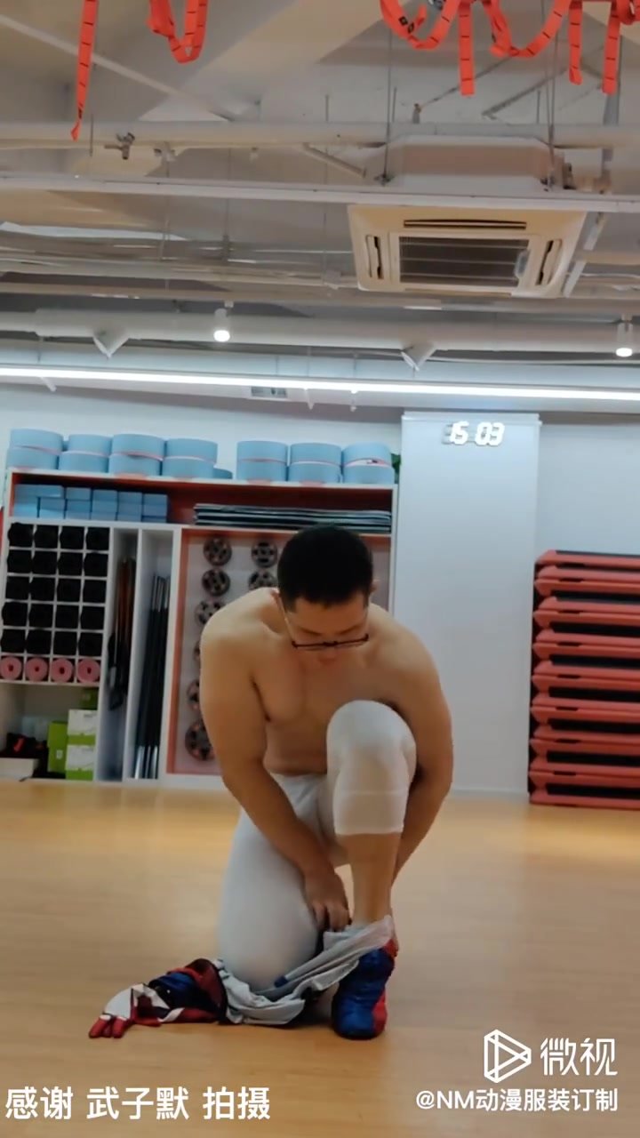 chinese muscle boy wears spiderman suit