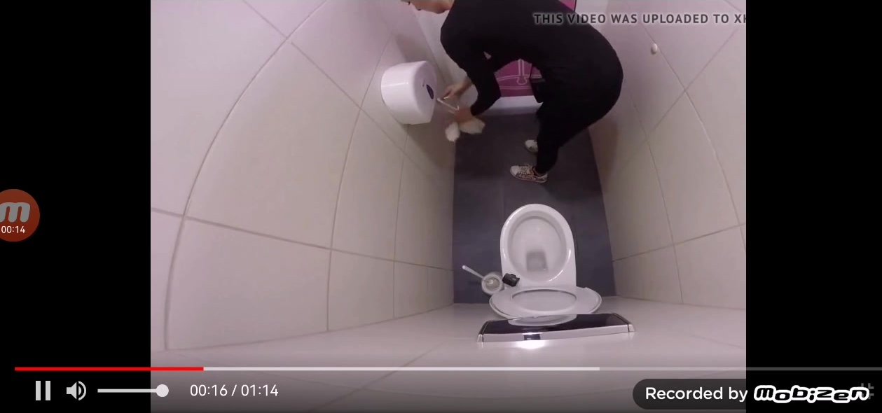 Woman peeing hard in restaurant toilet