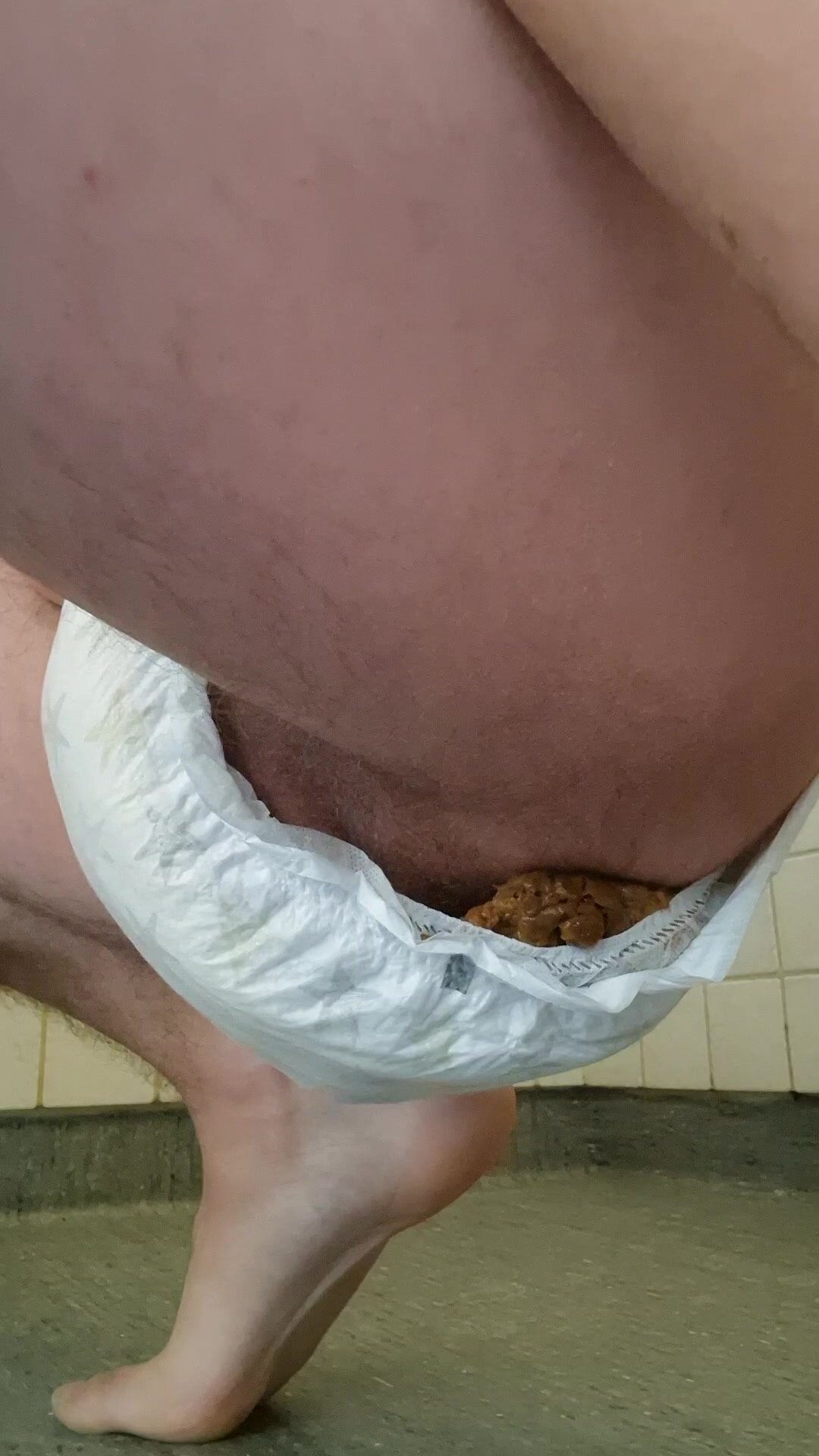 Side view of big diaper mess