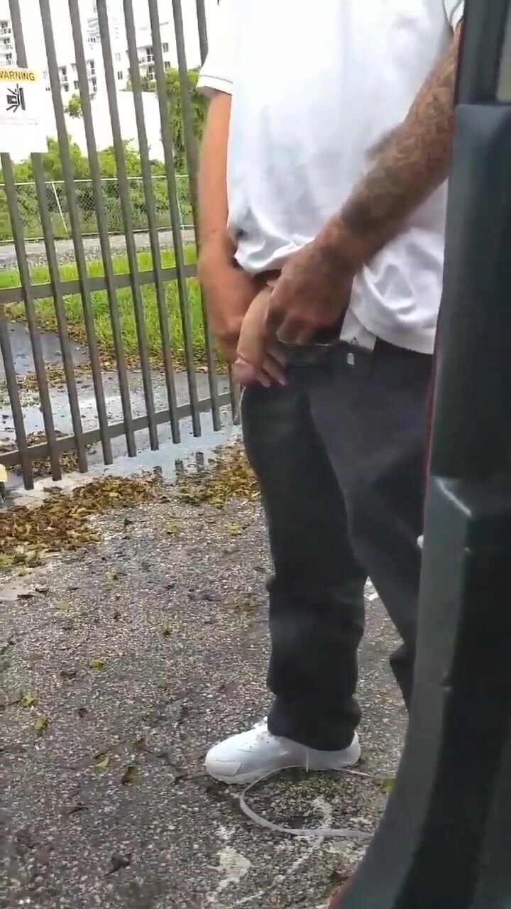 Huge long cock pissing outdoor