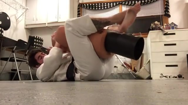 A sexy taekwondo master practicing