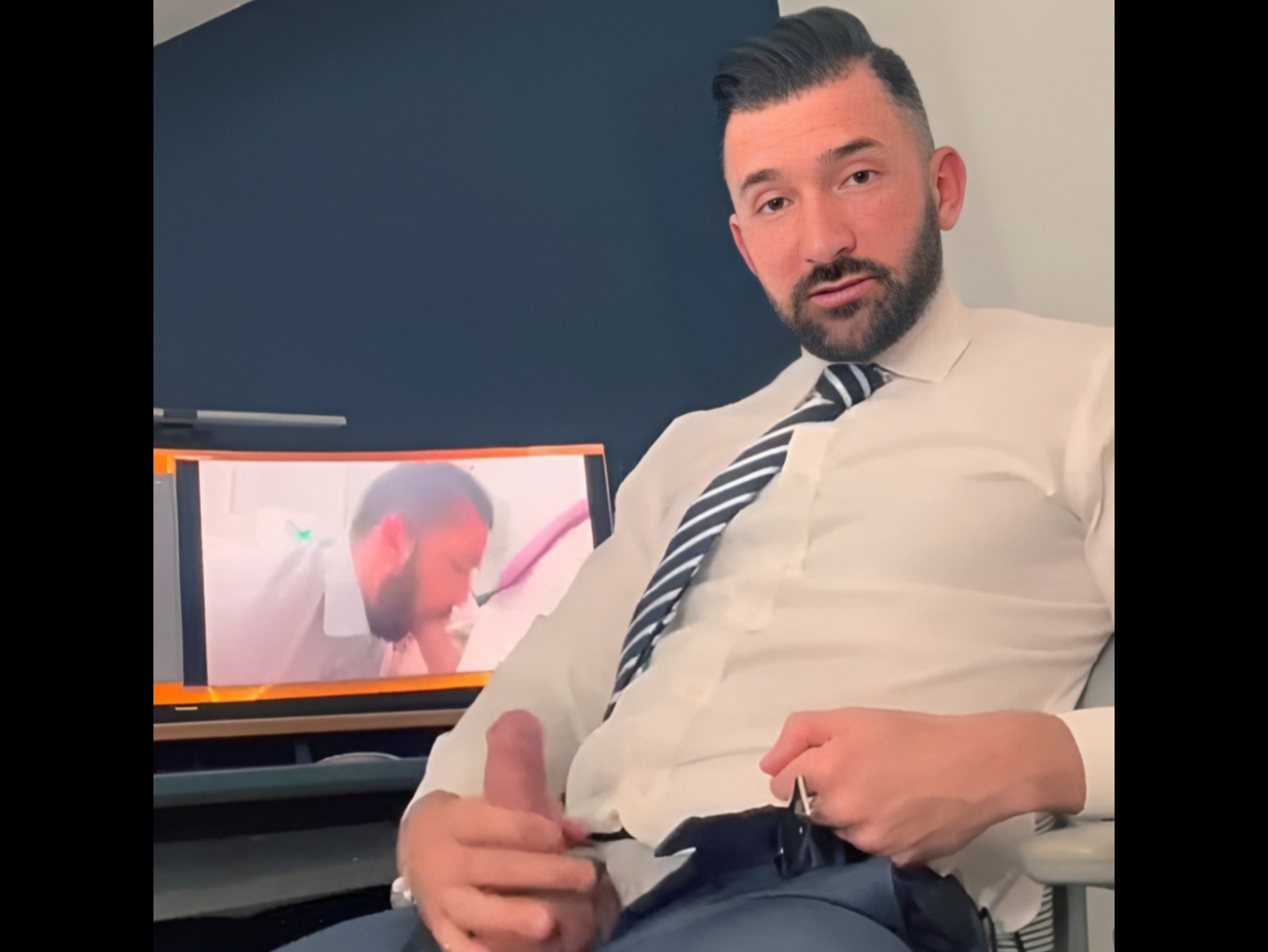 Executive Man Masturbating in the Office