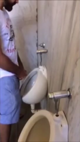 Man at urinal