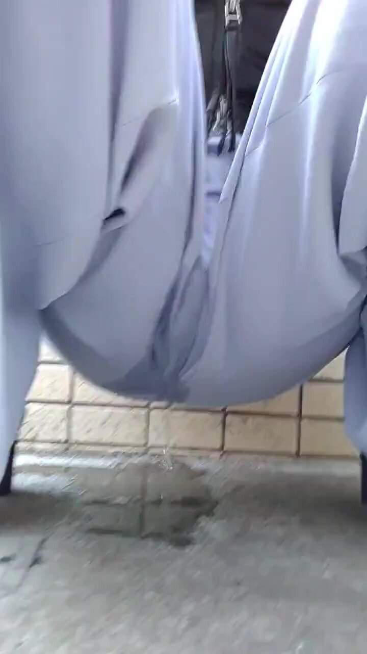 Girl pee in her white pants