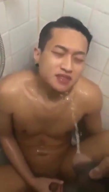 Asian  Guy Enjoying  Piss Shower From Friend