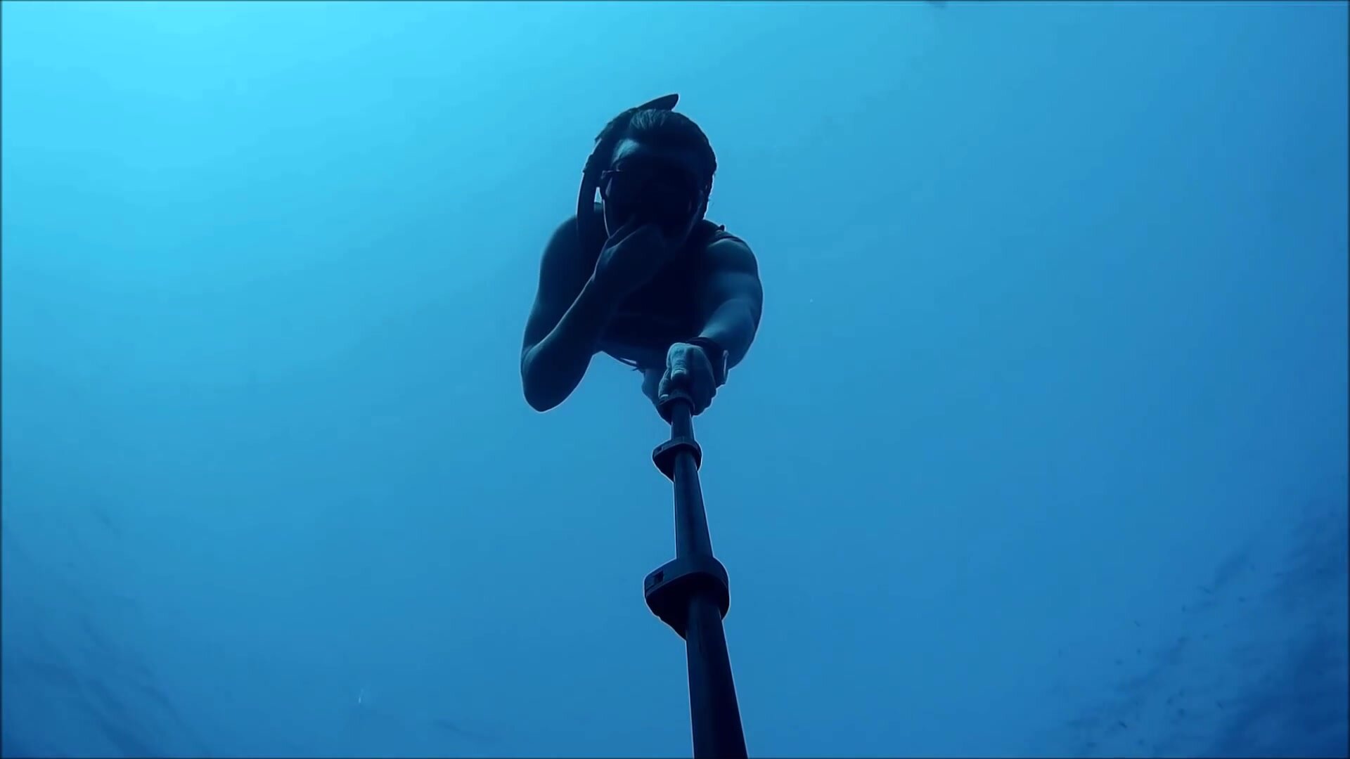 Underwater selfie wetsuit girl