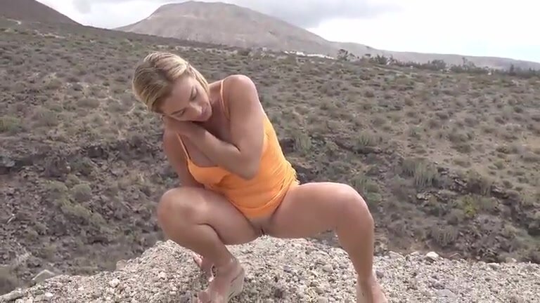 Public Pissing - Blonde peeing outdoors